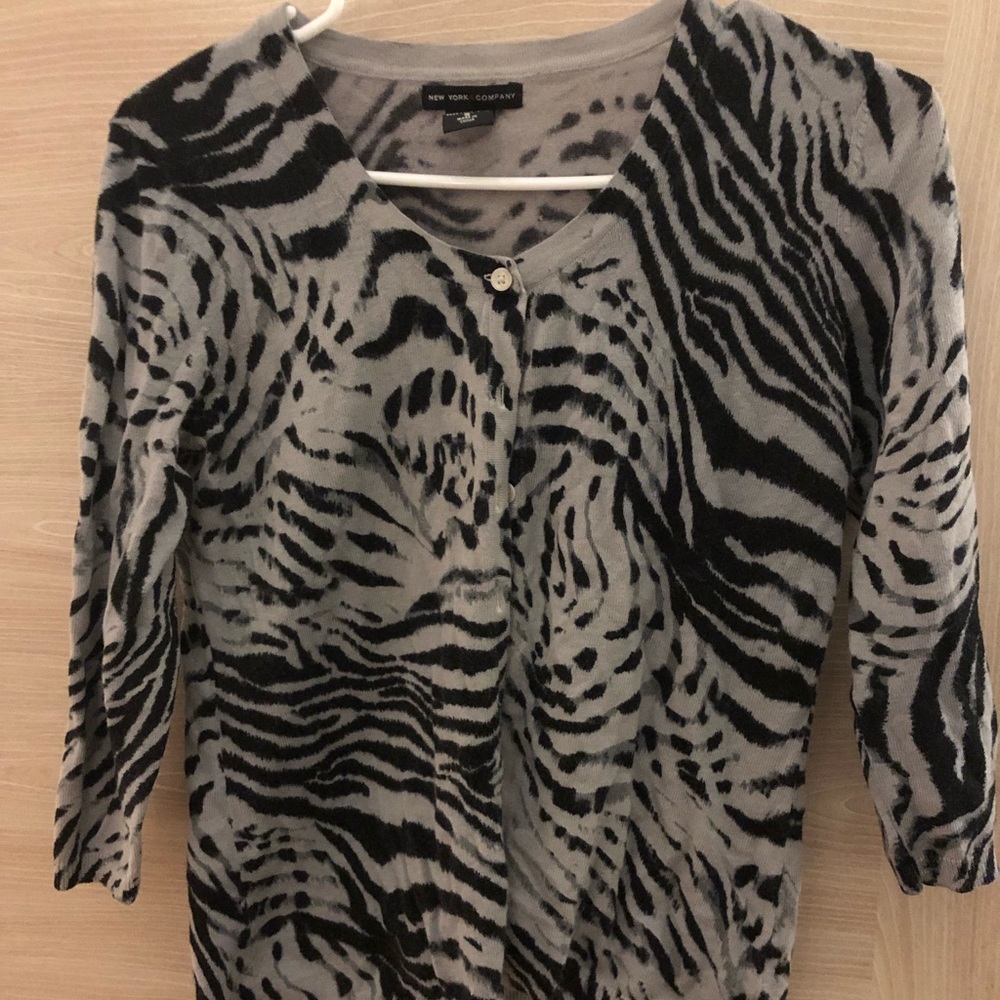 Animal print cardigan.